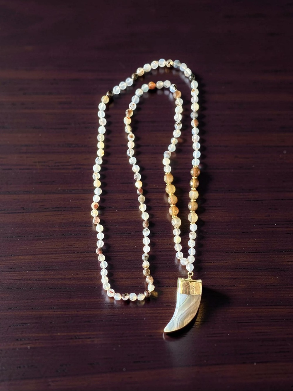 Gold and White Beaded Necklace with Horn Pendant - Women's Jewelry